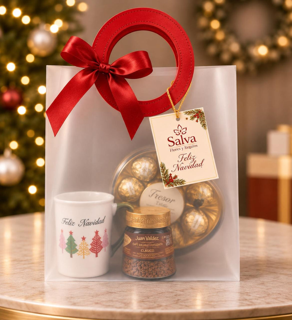 Ancheta de lujo navideña con taza, café y chocolates en bolsa de regalo con moño rojo – Salva Flores y Regalos