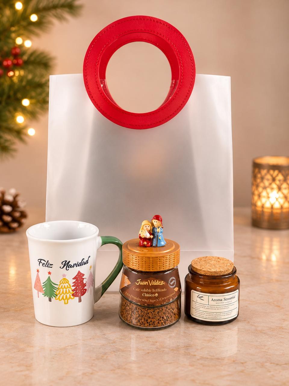 Contenido de la ancheta de lujo: taza Feliz Navidad, café Juan Valdez y vela aromática