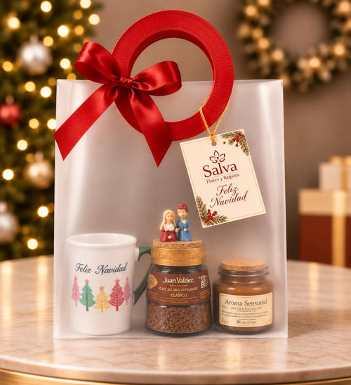 Ancheta de lujo navideña con taza, café y vela aromática en bolsa de regalo con moño rojo – Salva Flores y Regalos
